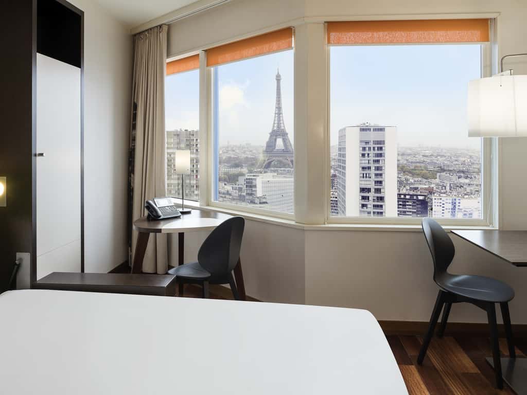 Adagio Paris Tour Eiffel has one of the best Eiffel Tower room views in Paris. This photo shows the view from the bed of the room. 