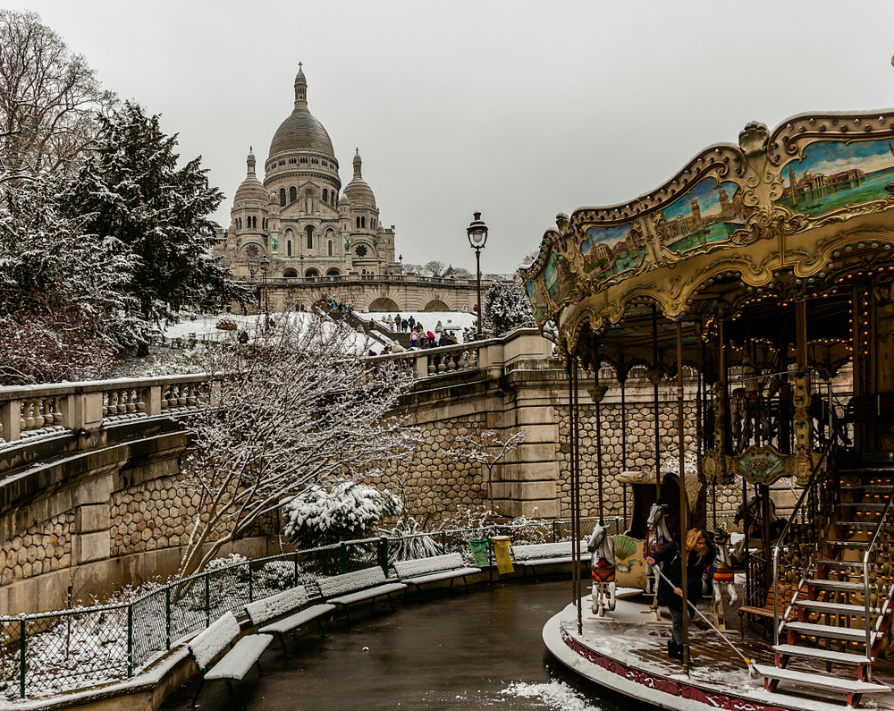 Church of the Sacred Heart one day of snow. Winter is one of the best times to visit Paris. 