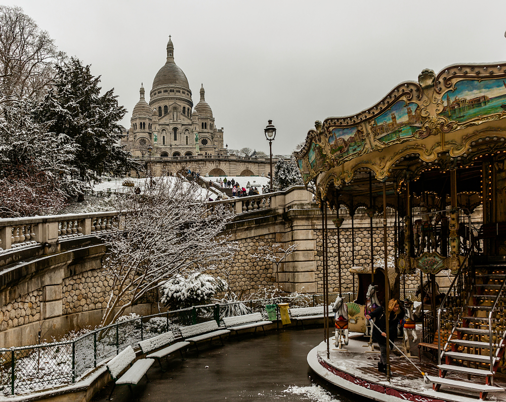 Church of the Sacred Heart one day of snow. Winter is one of the best times to visit Paris.