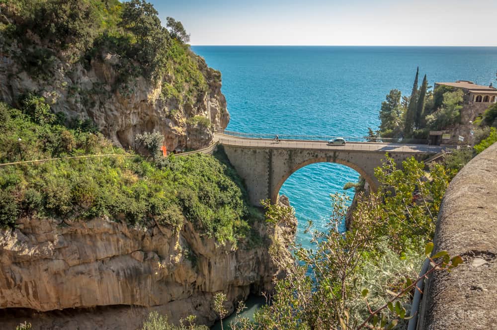 rental car in italy driving on high bridge