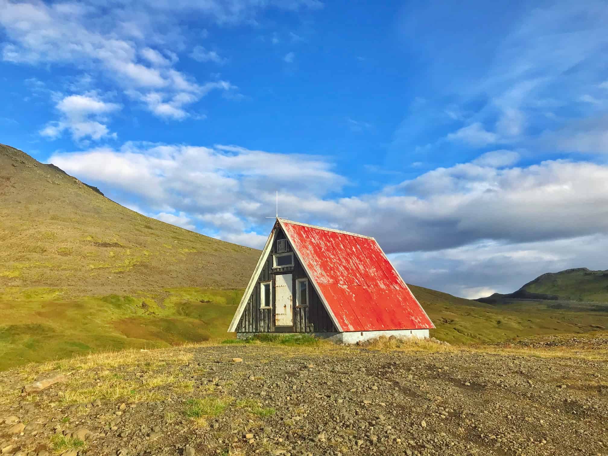 Red hut on top of a Snaefellsnes Peninsula mountain pass in west Iceland