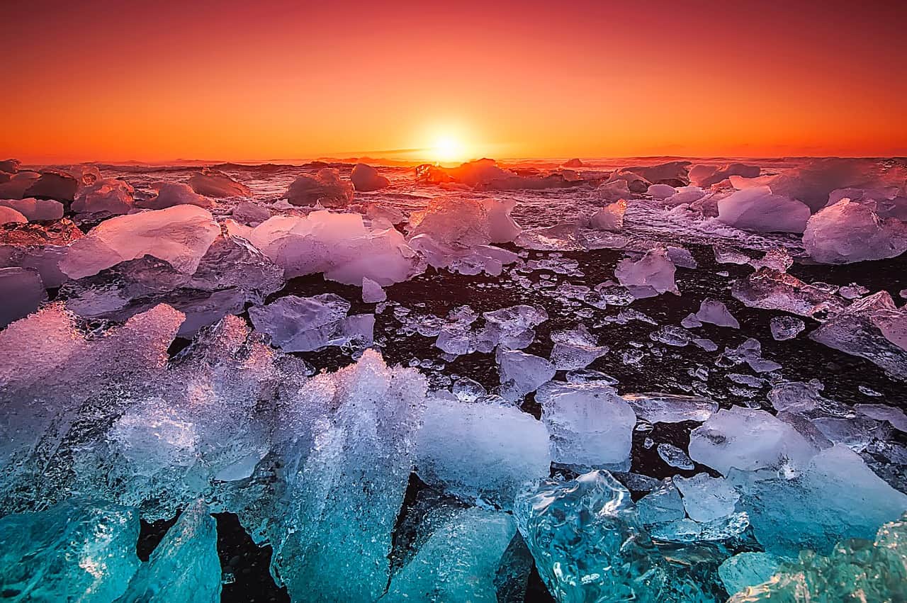 Diamond beach in Iceland is where you can see chunks of ice on a black sand beach in Iceland