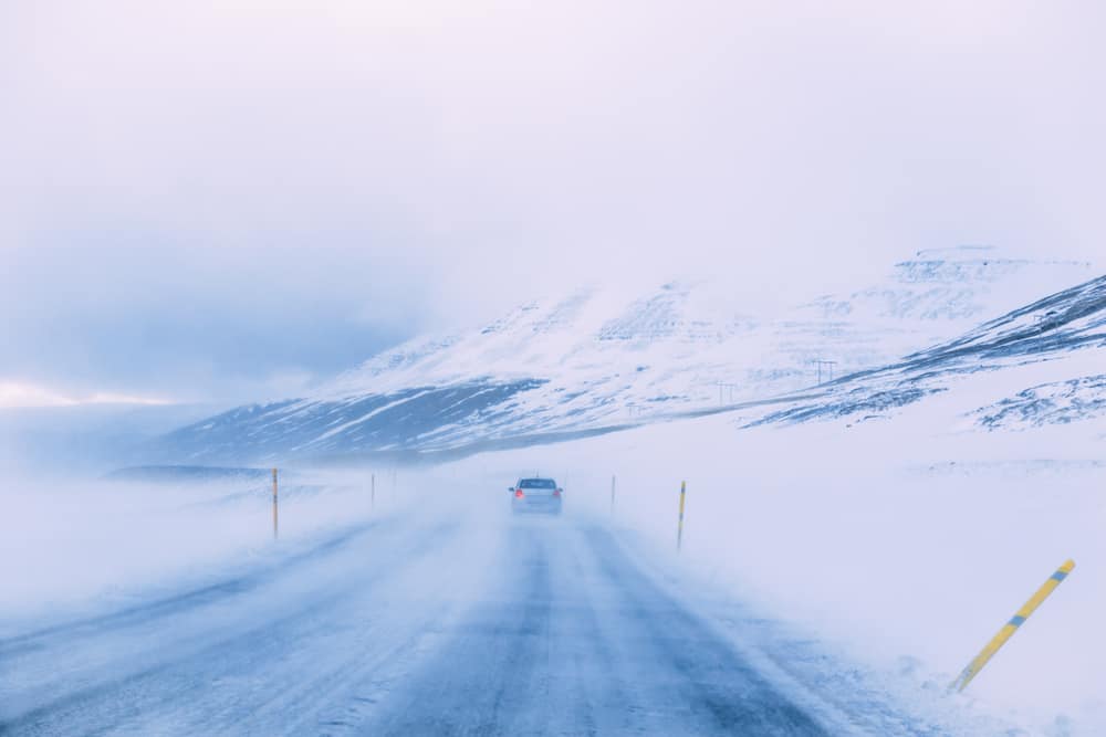 when driving in Iceland, make sure to heed wind and weather warnings so the road isn't icey!