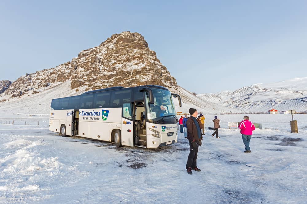 tour bus in iceland with tour group