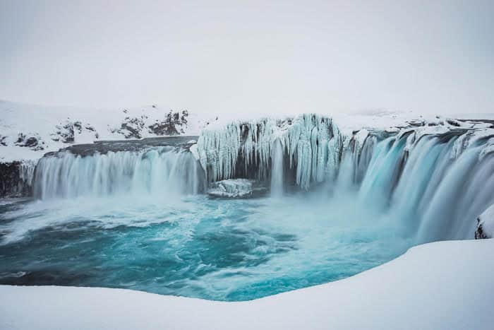 visiting Godafoss waterfall is one of the Things To Do In Iceland In Winter