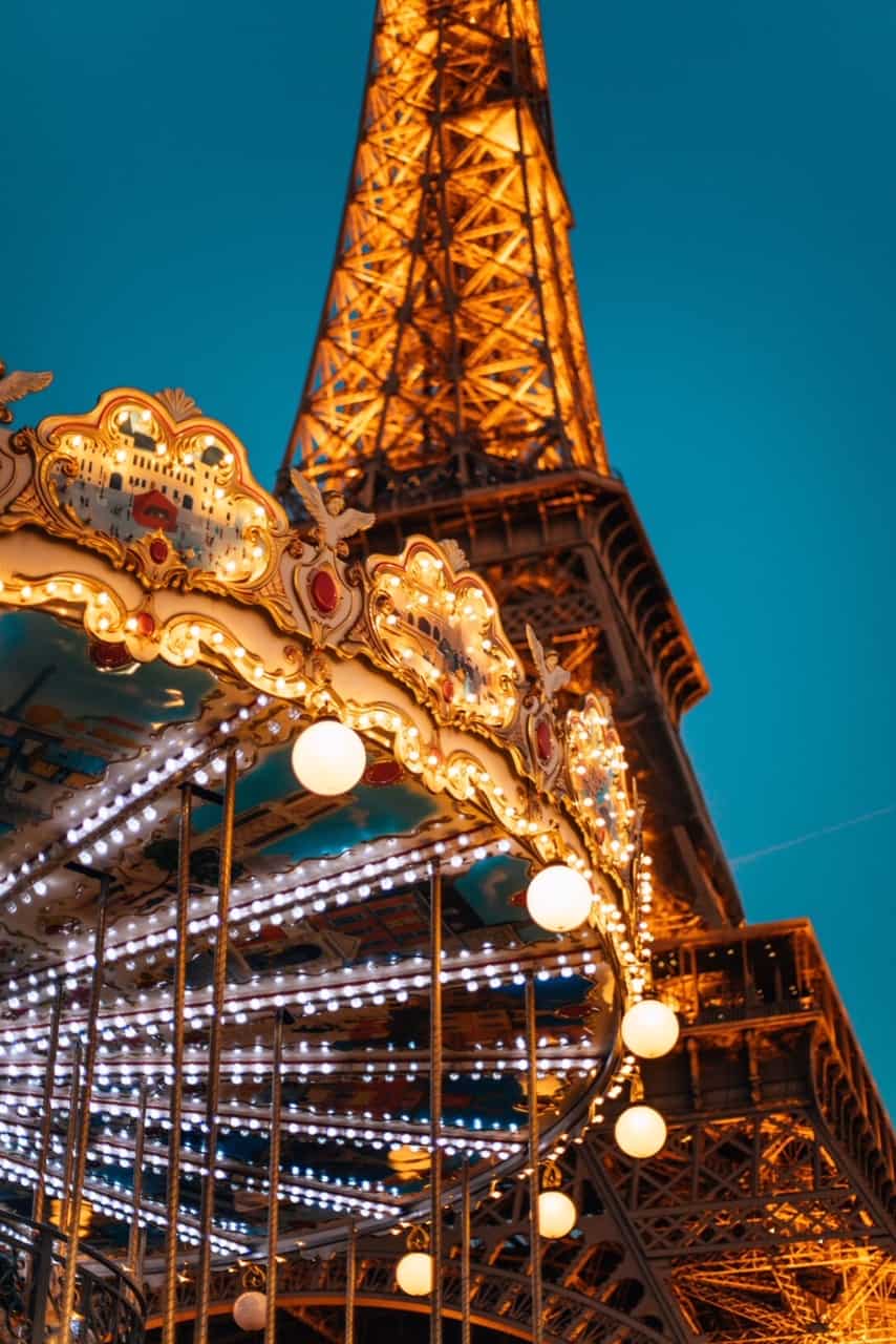 Paris photography of Eiffel tower and carousel during your paris itinerary 