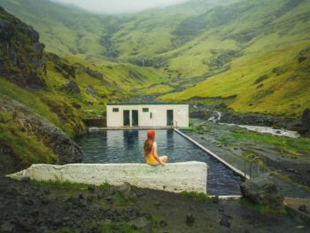 What to expect when visiting Seljavallalaug hot springs in Iceland | Seljavallalaug pool Iceland