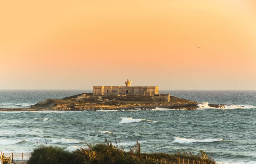 Isola Delle Correnti at sunset in Sicily Italy