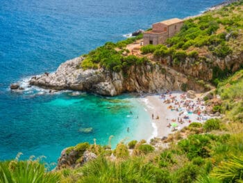 Beautiful Sicily Beach Riserva Naturale Dello Zingaro with people on it