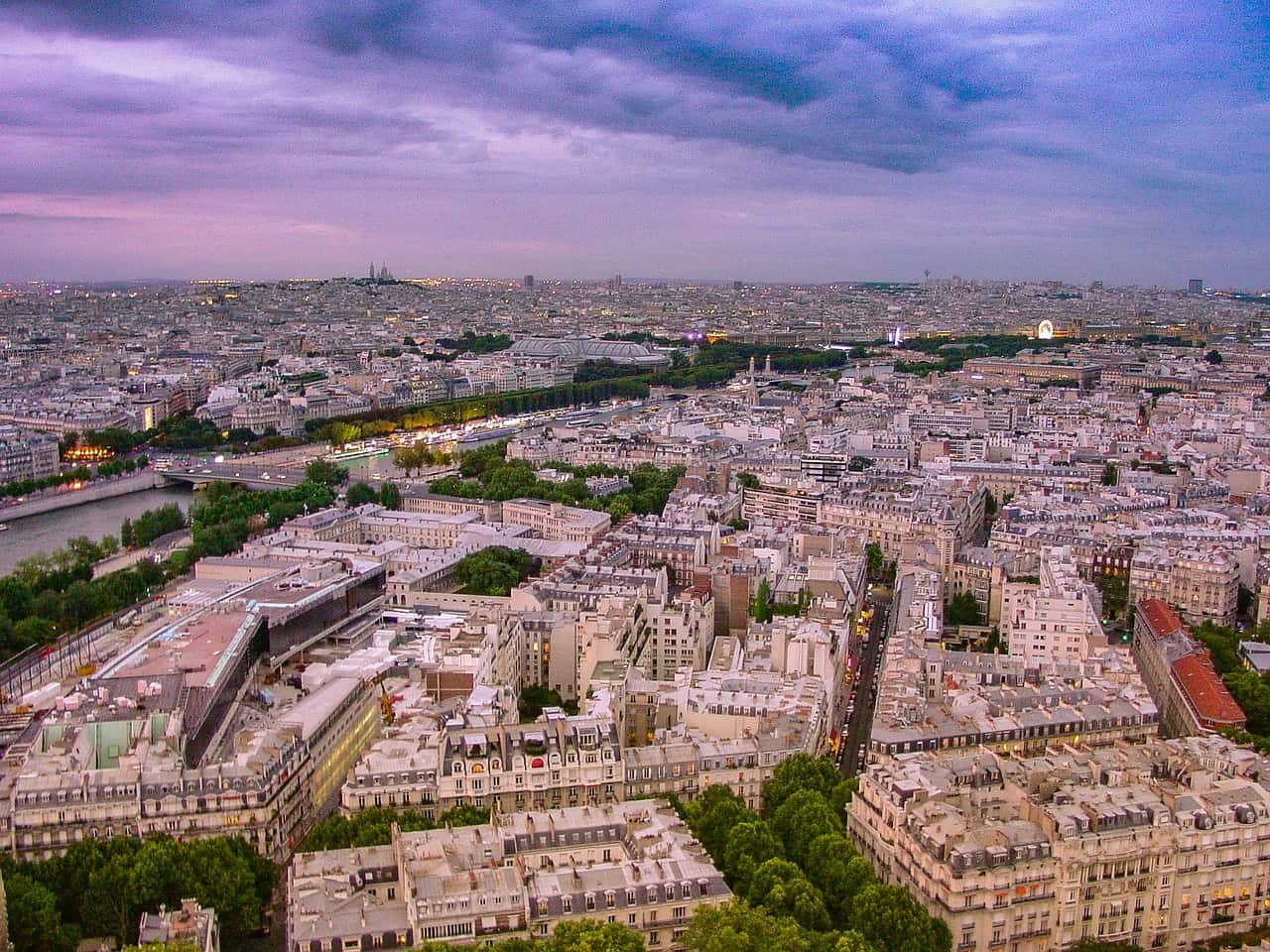 Paris sunset view from on top of the eiffel tower 