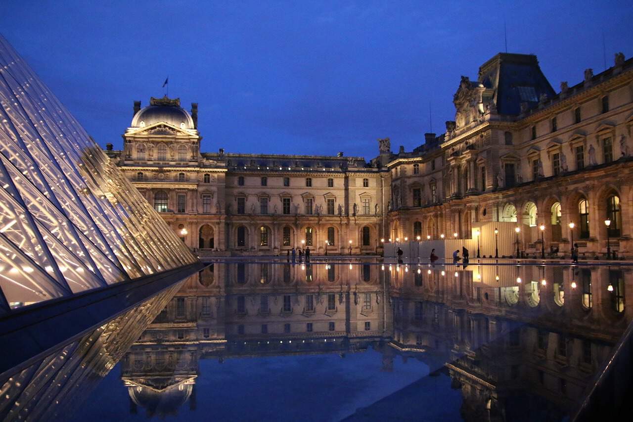 Stroll Around The Louvre Pyramids During Sunset in paris