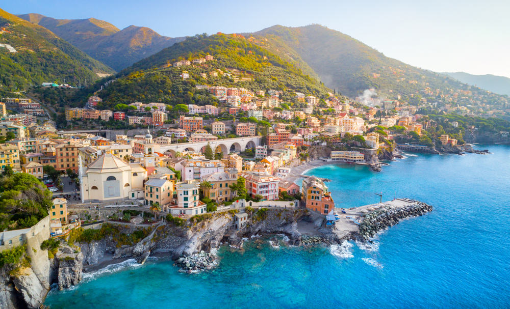 Aerial view of a coastal town in Italy and the rugged coastline.