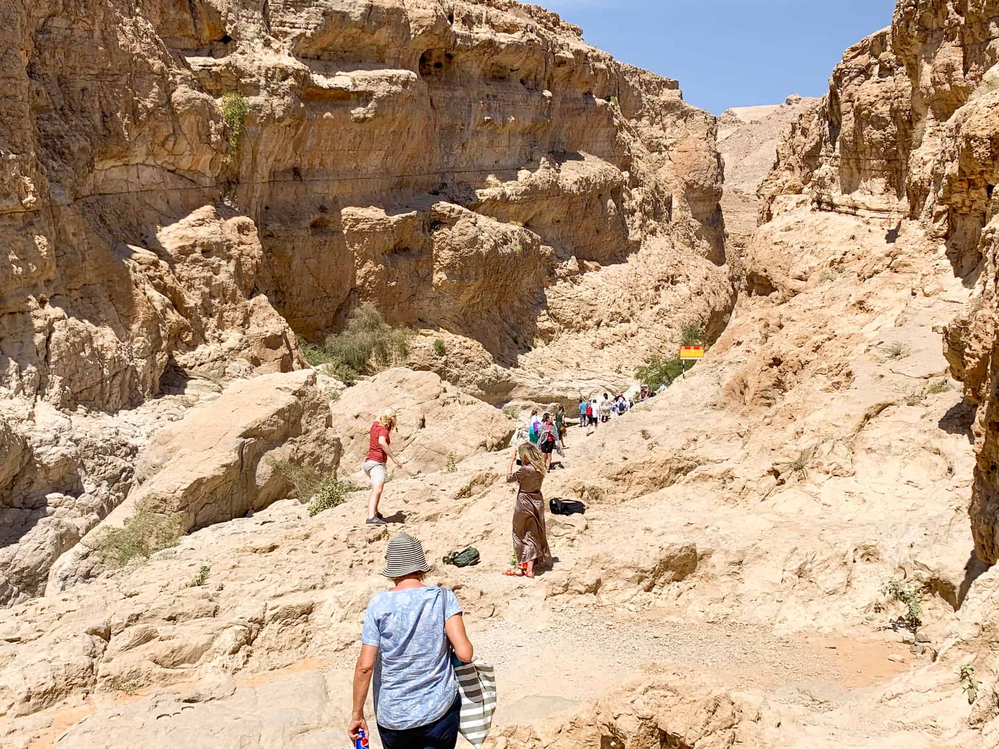 People hiking into Wadi Bani Khalid