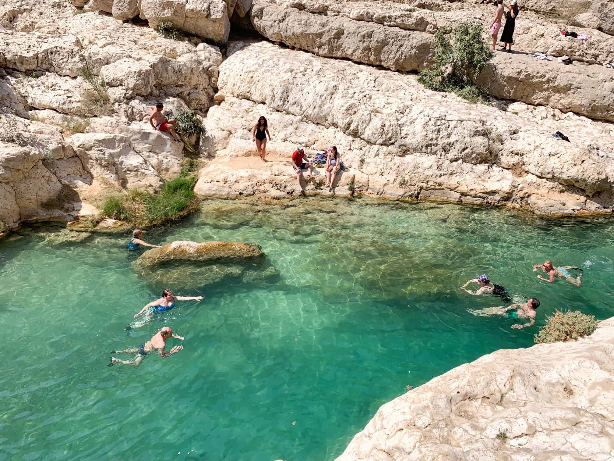 People swimming in Wadi Shab