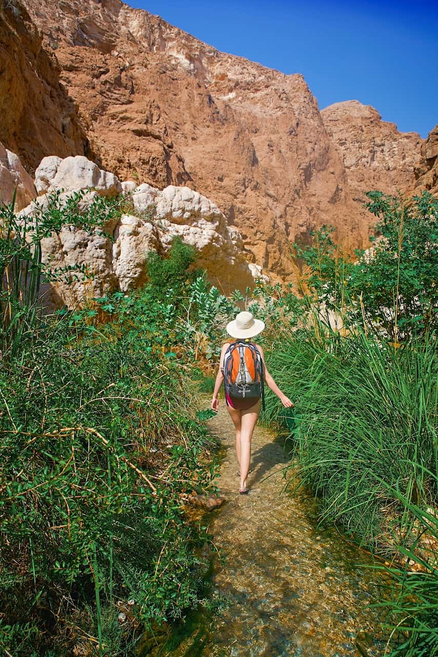 Hiking between pools in Wadi Shab