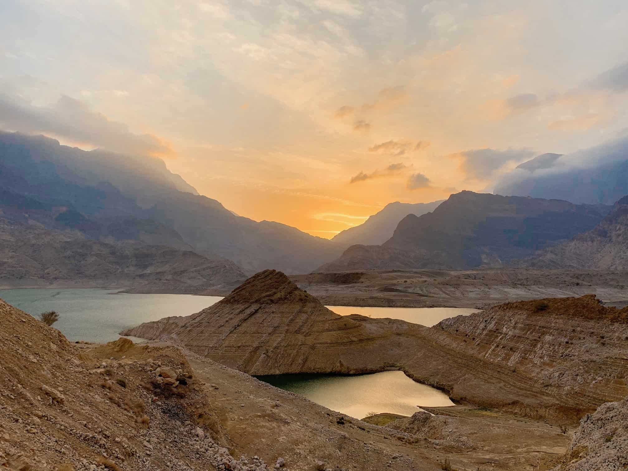 Watch The Sunset Over Wadi Dayqah Dam for one of the best places to visit in Oman 
