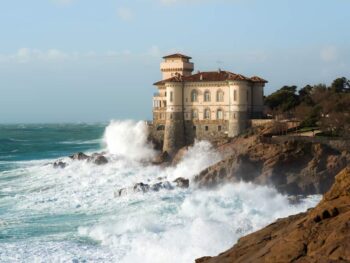 Sitting on the edge of a small cliff, Castello del Boccale is an epic castle in Tuscany