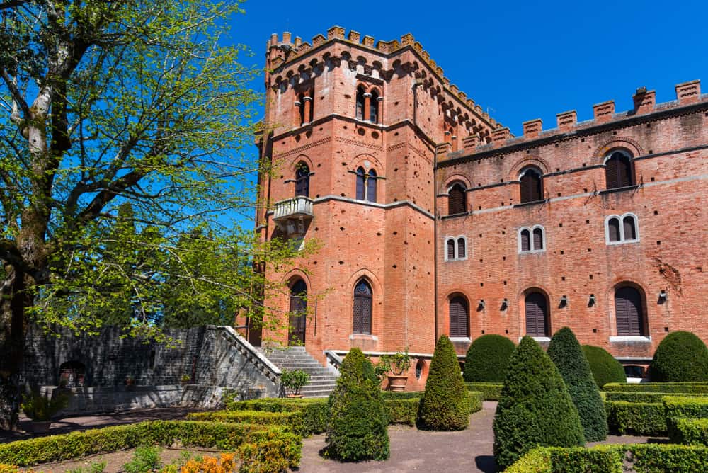 Castello di Brolio is an imposing red brick castle in Tuscany
