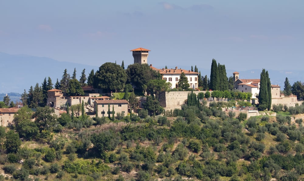 Castello di Vicchiomaggio with several of its outer building on a hilltop displaying just one of the beautiful Castles in Tuscany 