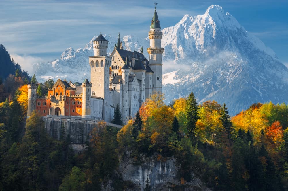 One of the most famous castles in Germany, Neuschwanstein Castle has epic mounts as a backdrop and trees around it