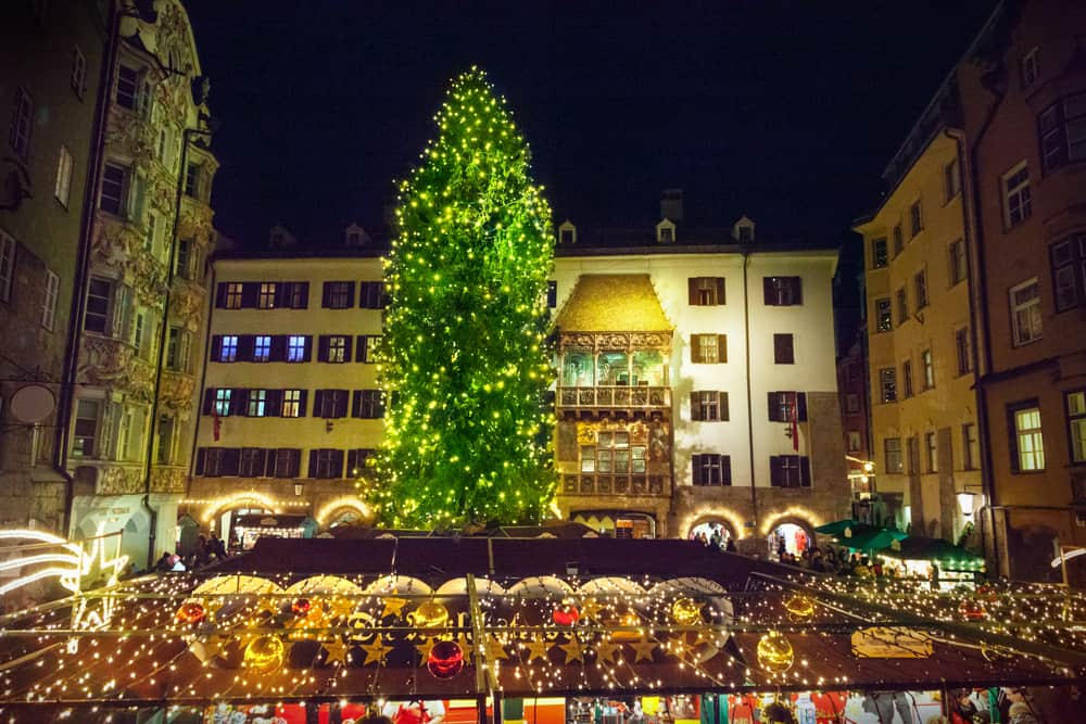 A magnificent tree in the town of Innsbruck, one of the charming Christmas markets in Austria 