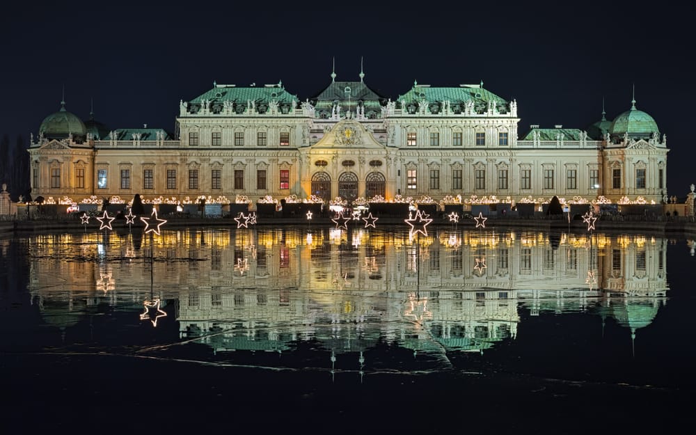 Stunning view of the lake and Belvedere Palace in Vienna, one of the Christmas markets in Austria