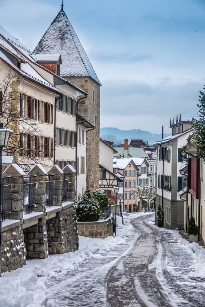 Enjoy the snow as you walk through the streets of the Rapperswil Christmas market