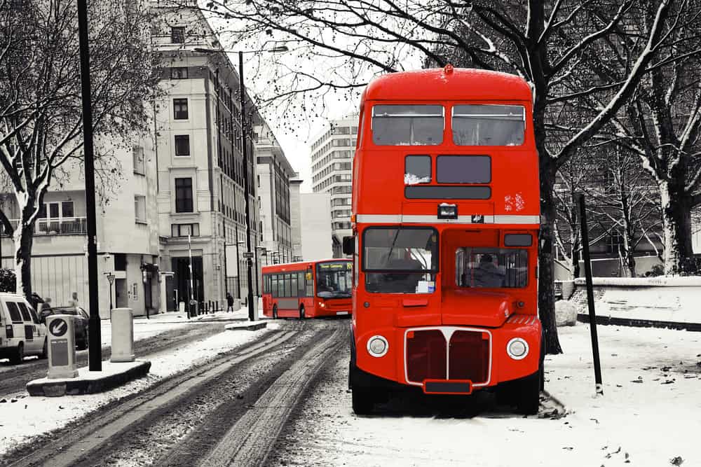 London in winter, double-decker bus in the snow