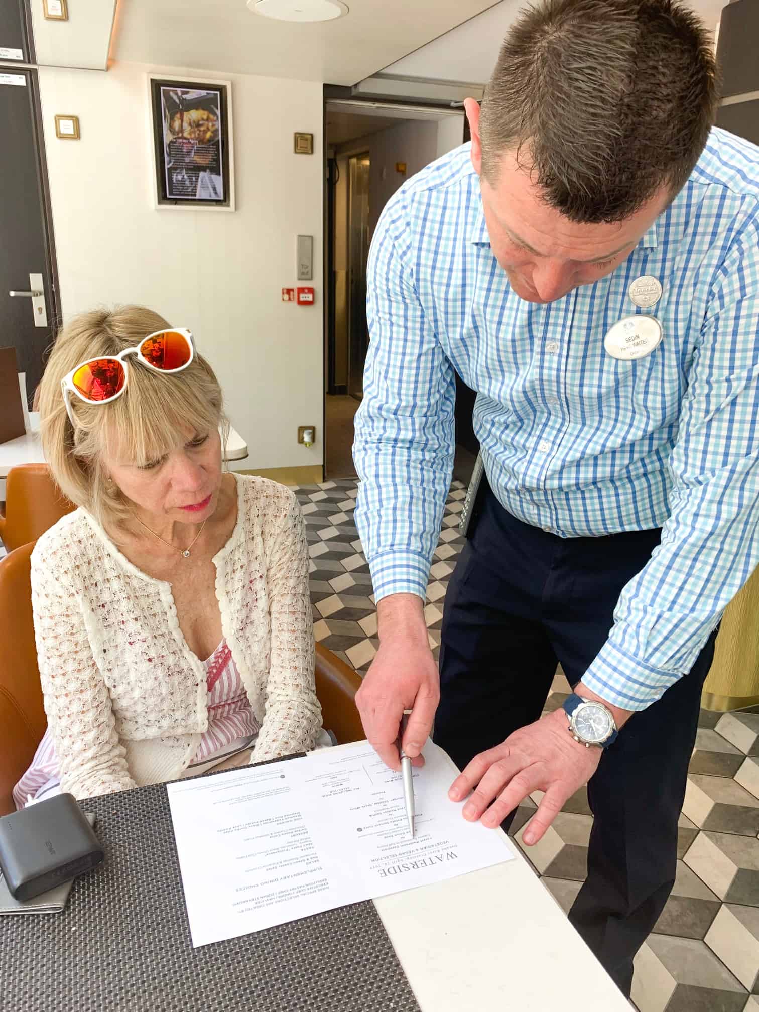 planning our menu with the head waiter of Crystal Mahler