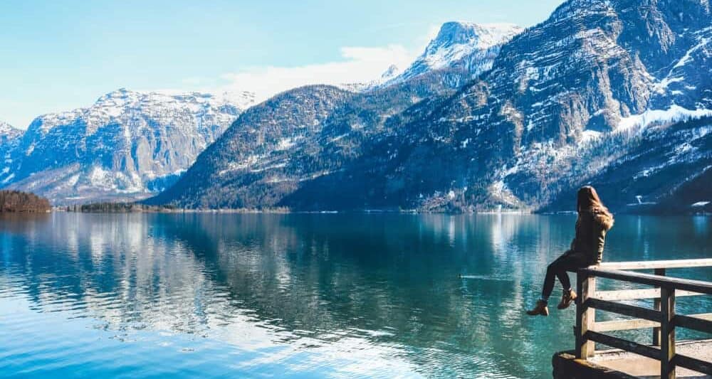 girl on dock in hallstatt austria