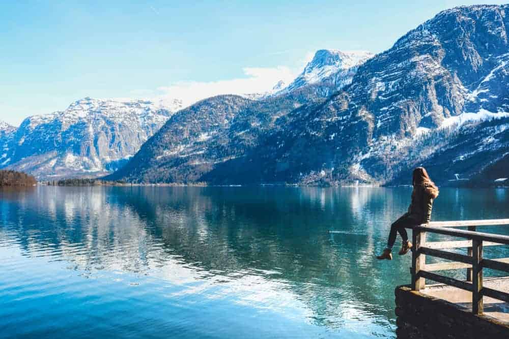 girl on dock in hallstatt austria