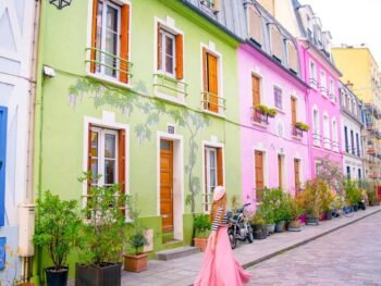this street full of colorful houses is one of the hidden gems in paris