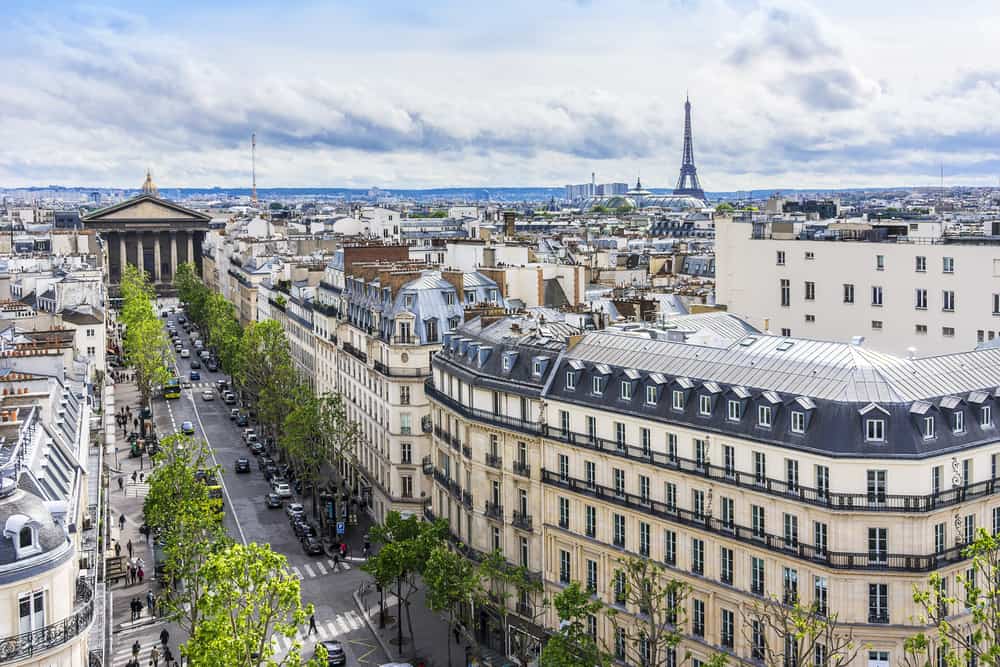 one of the hidden gems in Paris has this unique view of the Eiffel tower from their roof top terrace