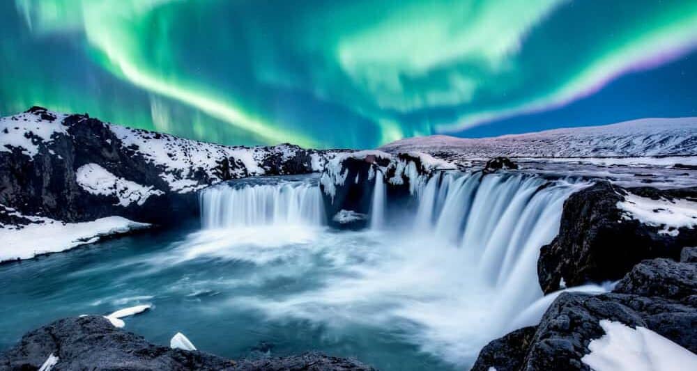 Northern Lights over Goðafoss in Iceland in December