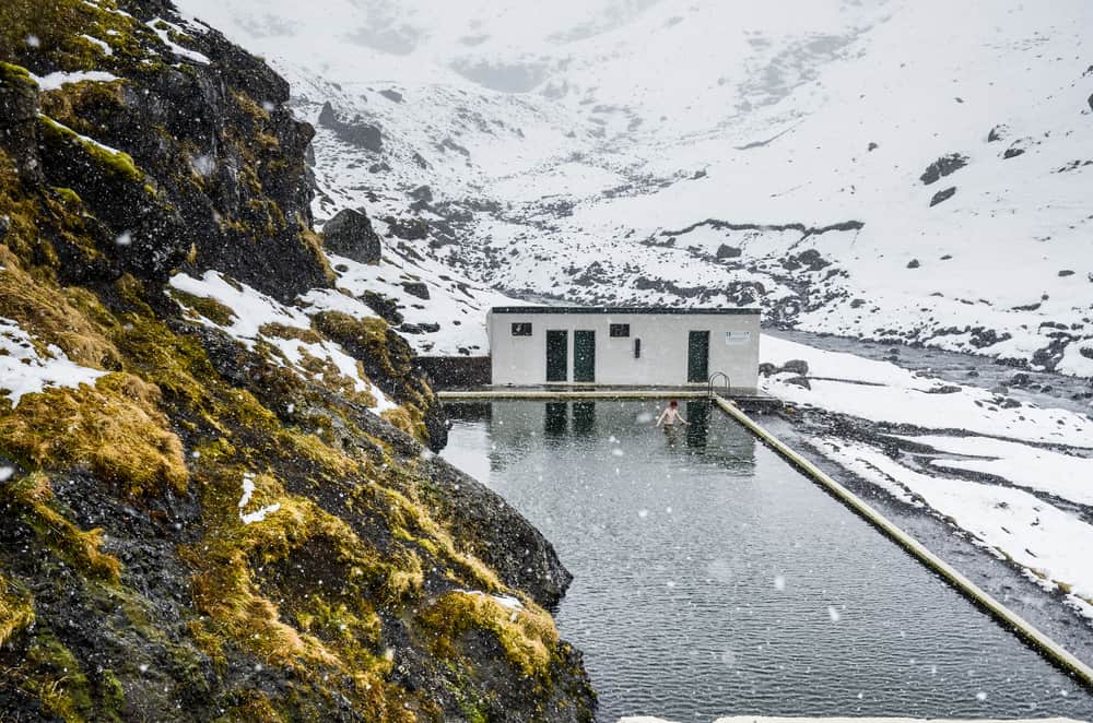 seljavallalaug with snow in Iceland in December