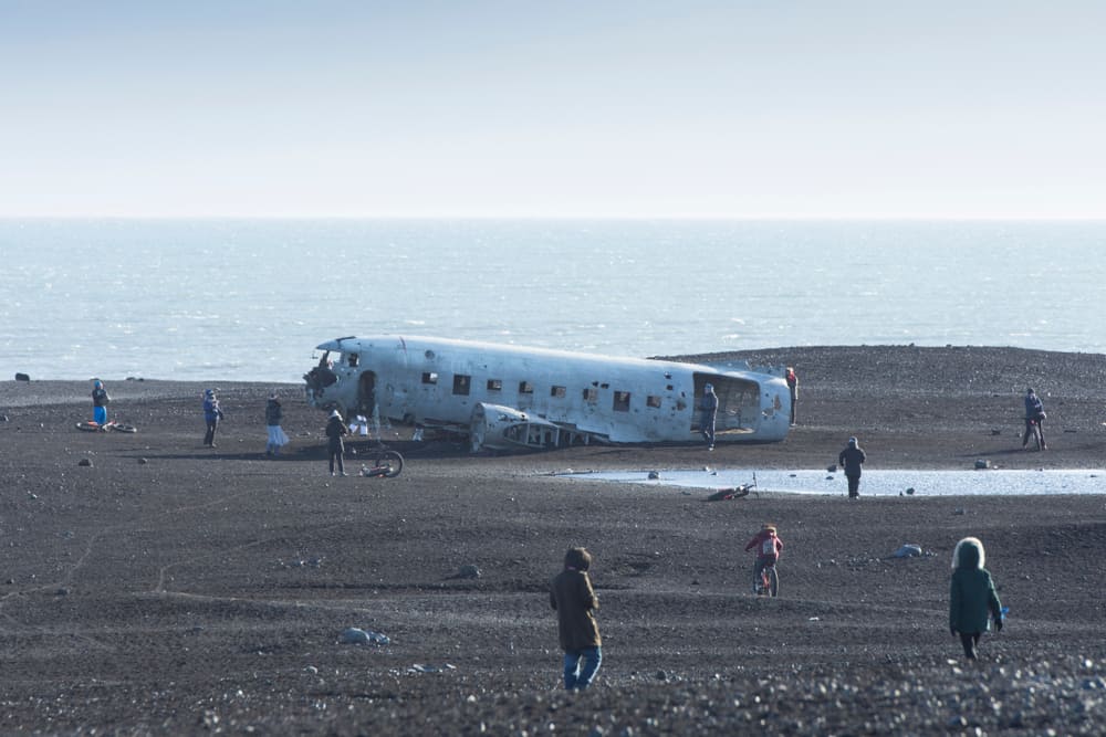 tourists walking around the Iceland plane crash