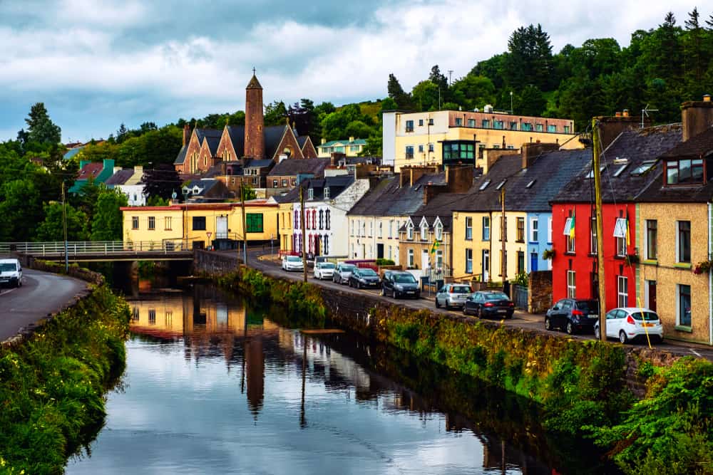 small town in ireland filled with ireland car hire vehicles 