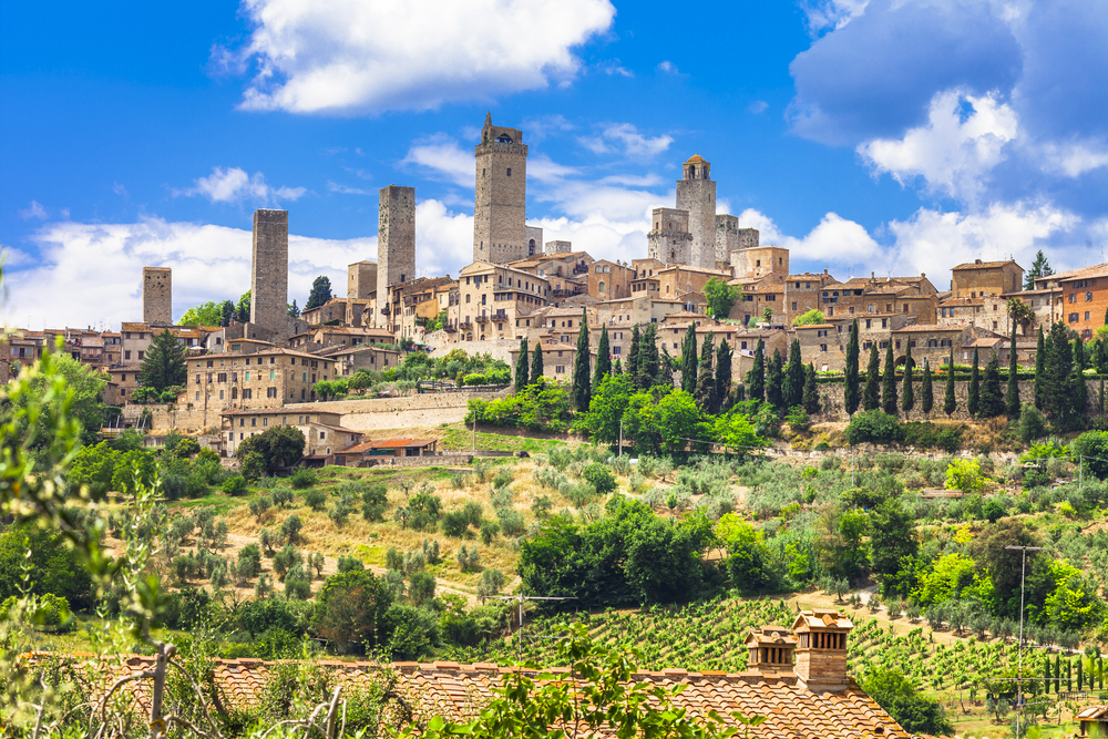 San Gimignano surrounded by greenery.