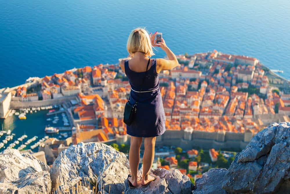 Having an adaptable converter for your technological needs will help you have fully charged devices that can take photos of panoramic views of cities, like in this photo!