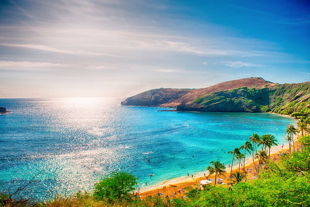 The sun can be hot and blinding like in this photo-- so make sure to add sunscreen to your Hawaii packing list to protect your skin!