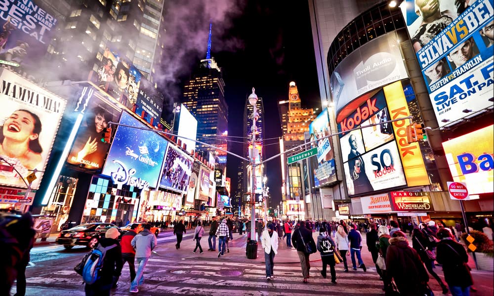 A view of Times Square at night, a perfect spot when you must see New York in a day!
