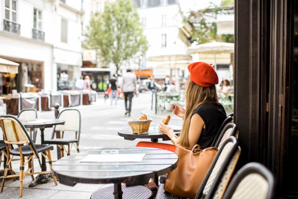 Paris has the best cafes like this one pictured-- make sure to stop and explore the food scene in France. It's so yummy!