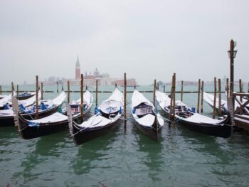 Enjoy a Gondola Ride with a blanket while visiting Venice in winter