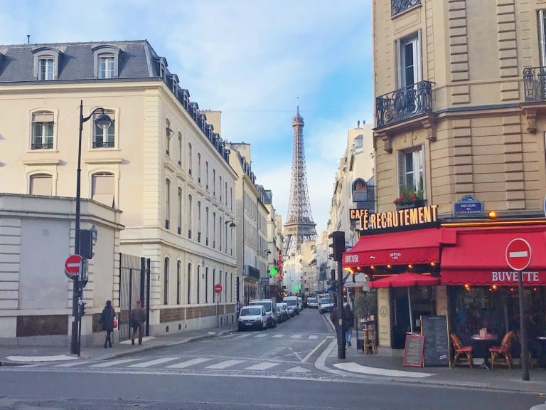 cafe in Paris with eiffel tower in background