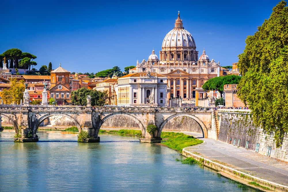 View over a river and bridge of the Vatican.