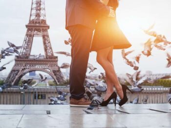 couple at sunrise on their paris honeymoon