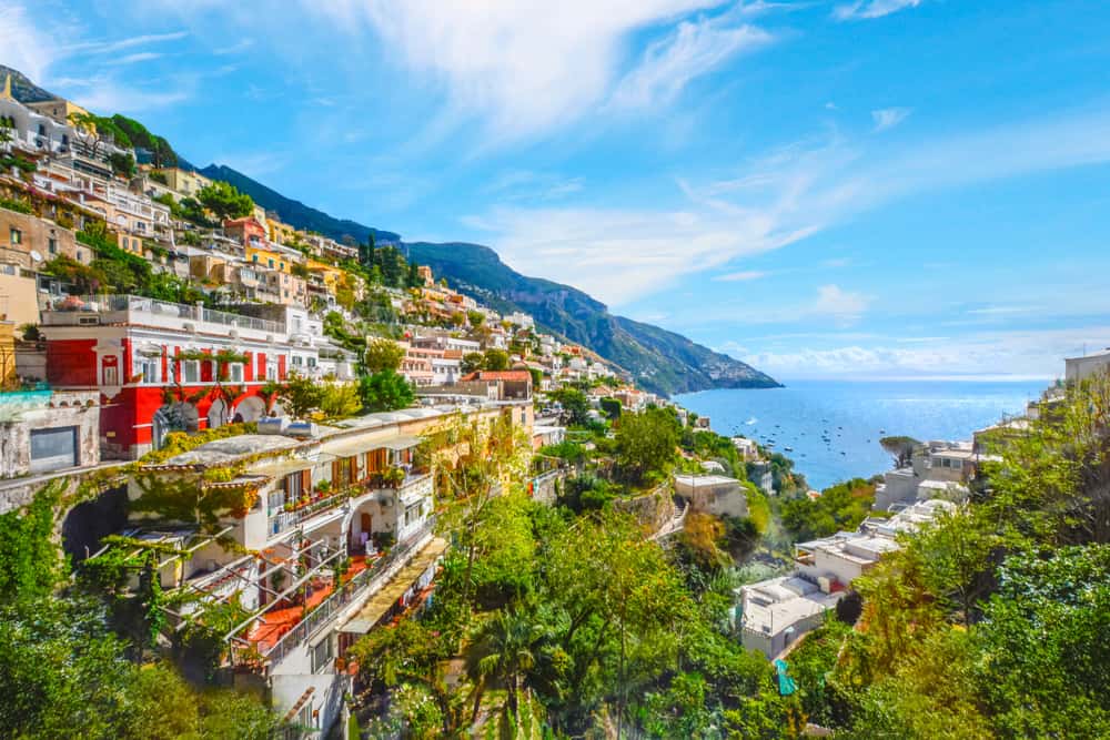 The colorful houses and mountainside of Praiano, an amazing choice of where to stay on the Amalfi Coast