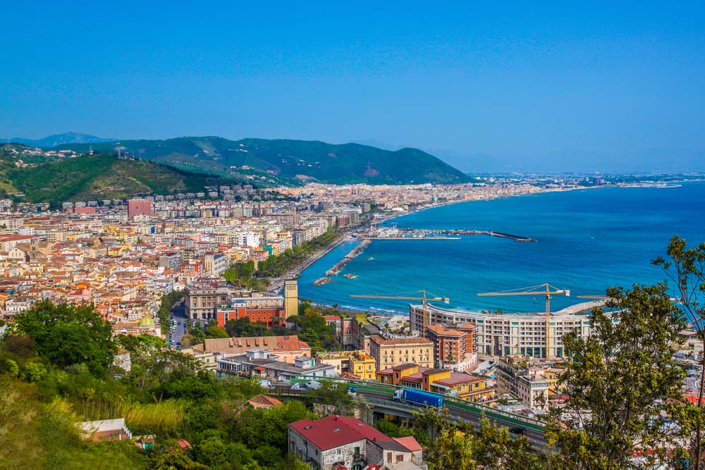 The lovely town and blue waters of Salerno, a great choice of where to stay on the Amalfi Coast