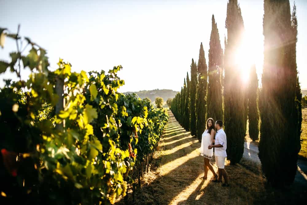 sunset in Tuscany with romantic couple