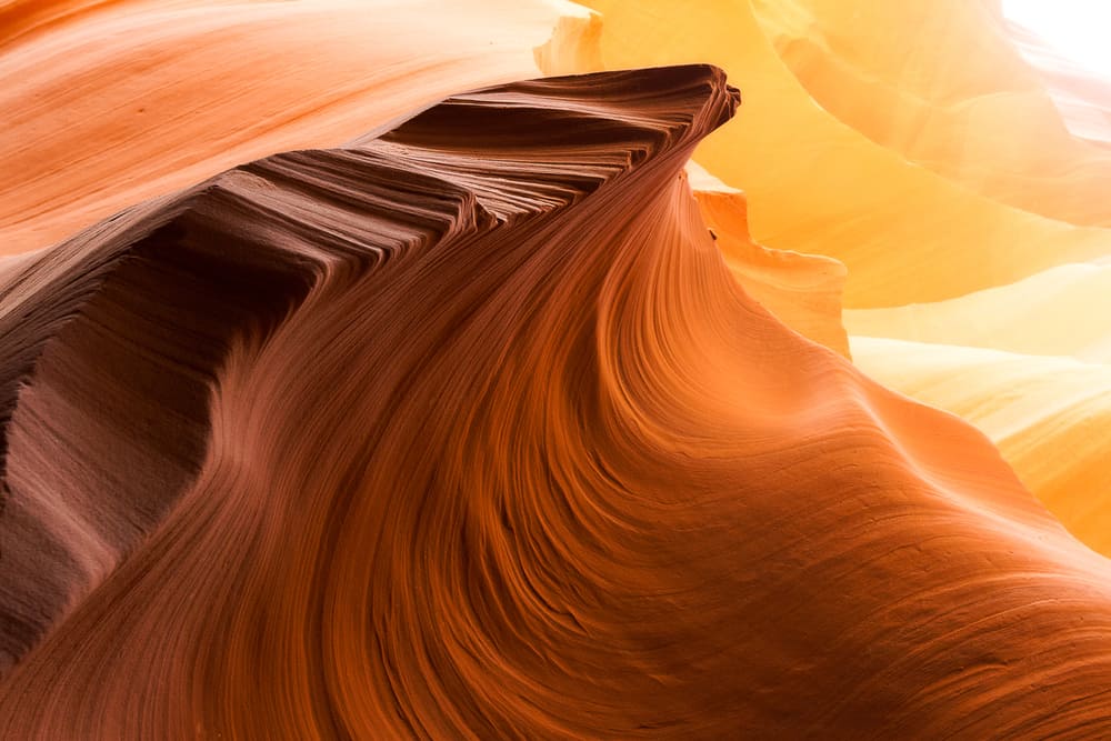 a curvy rock formation in Lower Antelope Canyon
